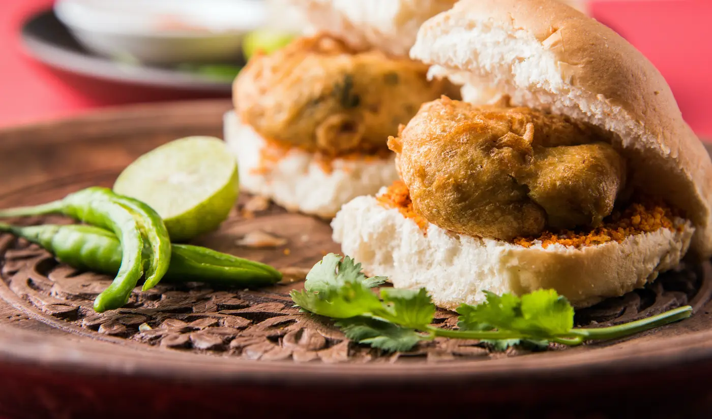 Vada Pav OR Wada Pao is Indian OR Desi Burger, is a roadside fast food dish from Maharashtra Vada Pav OR Wada Pao is Indian OR Desi Burger, is a roadside fast food dish from Maharashtra